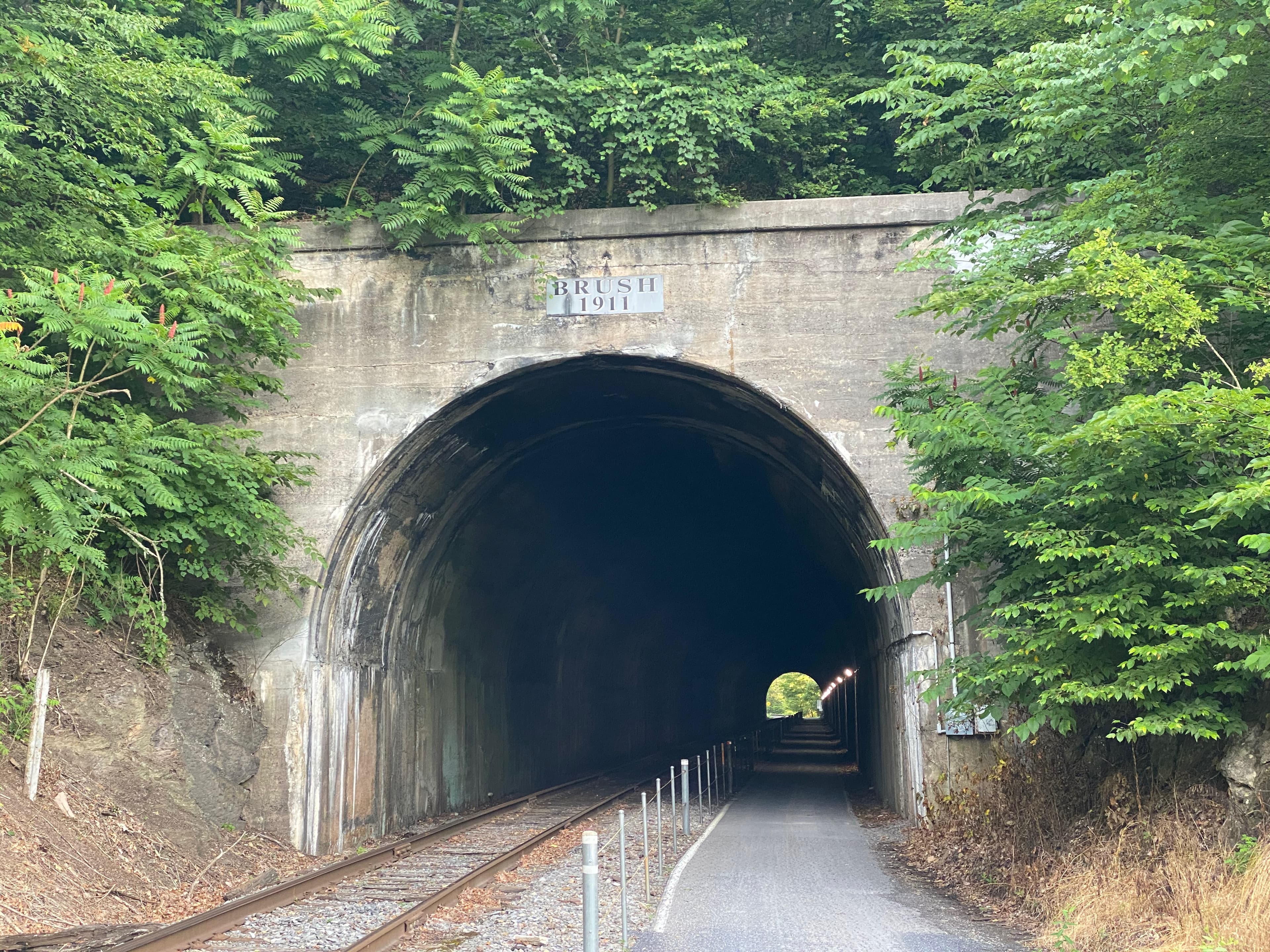 Paved rail-trail entering a tunnel on a Maryland multi-use path
